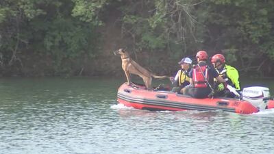 PHOTOS: Water rescue teams recover body of missing teen in Trotwood lake 