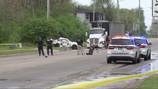 UPDATE: Coroner on scene of crash involving car, semi near Dayton bank