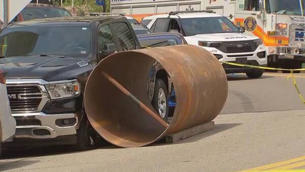 1-ton steel cylinder from construction site, rolls down hill, hits woman
