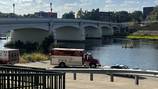 ‘He hasn’t come up;’ 911 caller searches river alongside other bystanders after man falls in